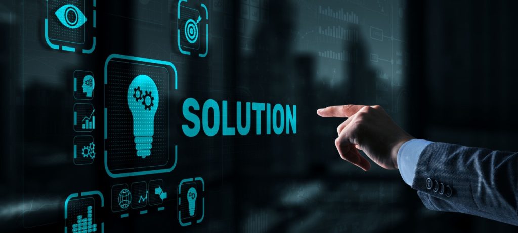 man pressing on touch screen interface with the word solution displayed